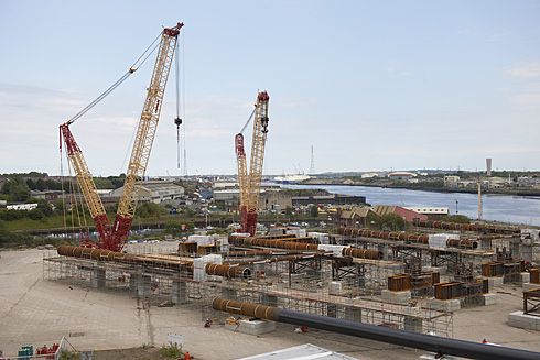 A high access point provides a view over the site to the sea beyond