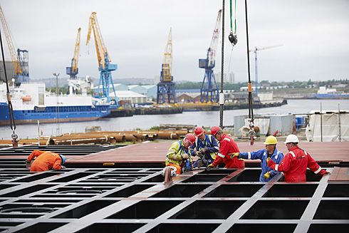 Aligning the new platform and winching the two parts together