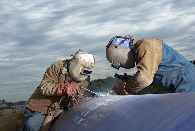Commercial Photographer, Water pipeline installation, welding, UK